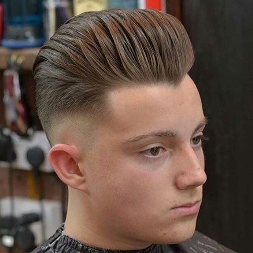 Best Round Face Haircuts - Slicked Back Pompadour with Mid Fade