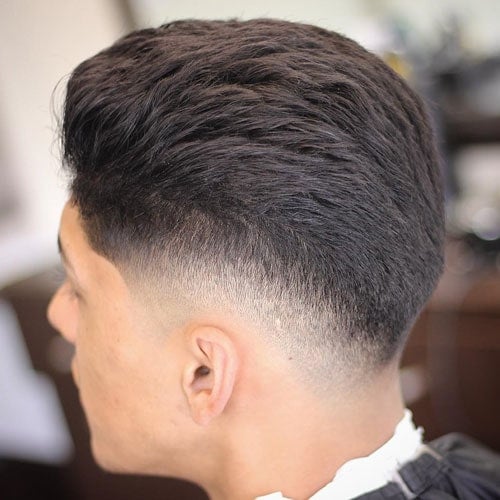 Brushed Back Hair with Low Drop Skin Fade