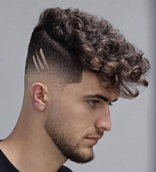 Brushed Forward Curly Hair with Disconnected Undercut