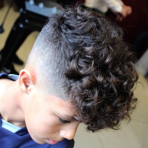 Cool Cute Boys Haircuts - High Fade with Thick Curly Hair on Top