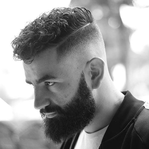 Curly Top + Skin Fade + Part + Full Beard