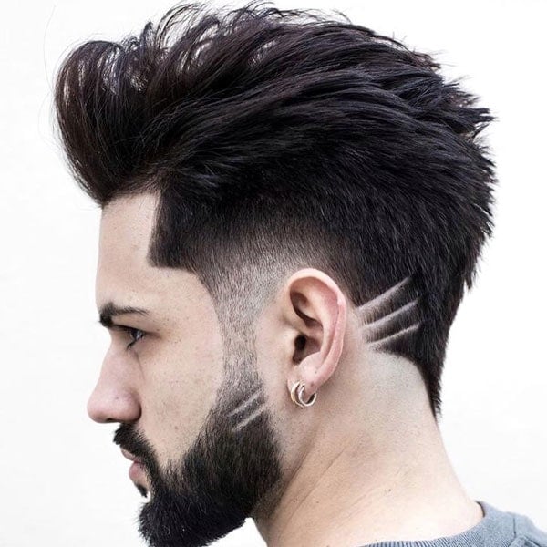 Edgy Blowout Taper Fade Hairstyle For Guys