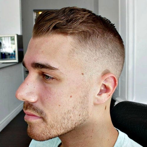 High Fade with Wavy Brushed Back Hair