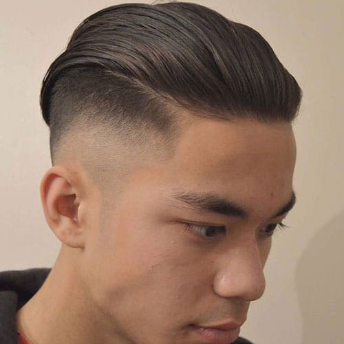 High Skin Taper Fade with Slicked Back Hairstyle