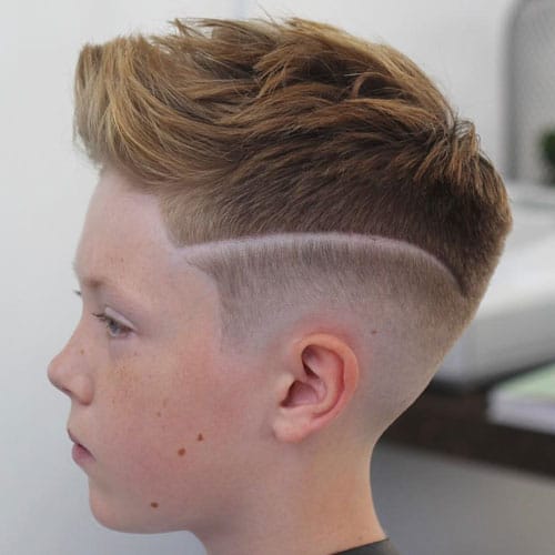 Low Bald Fade with Design and Brushed Up Hair