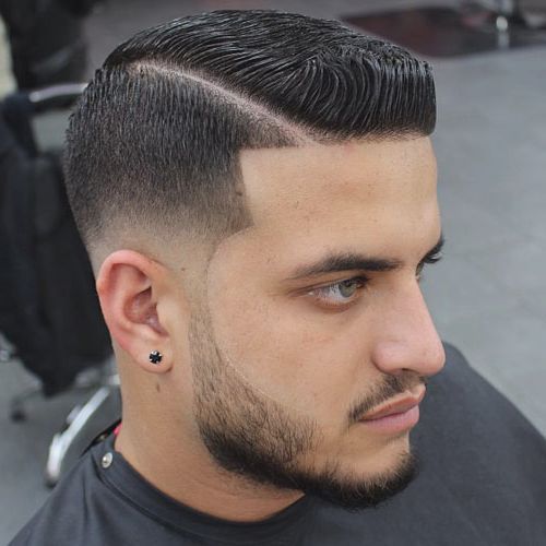 Low Skin Fade with Hard Side Part and Brush Up