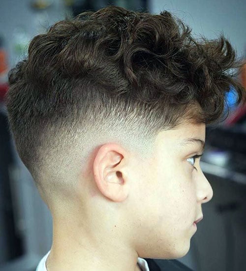 Messy Curly Hair with a Low Fade