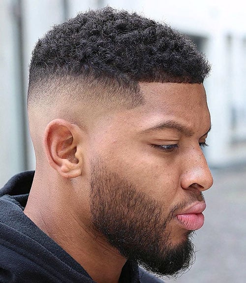 Short Curls with Mid Skin Fade and Shape Up