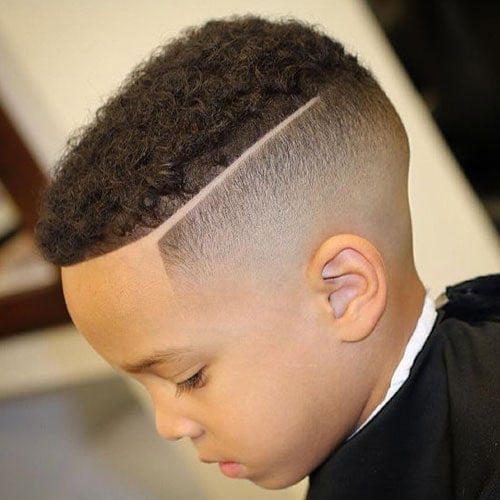 Skin Fade + Hard Part + Short Afro