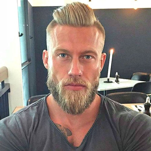 Slicked Back Hair with Undercut and Thick Beard