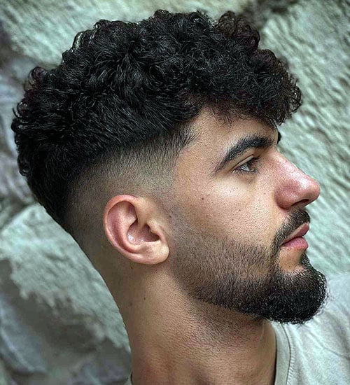 Thick Curls with Mid Fade