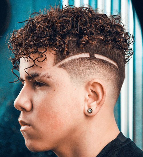 Tight Curls with Fade and Shaved Line