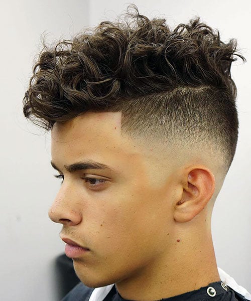 Tousled Wavy Hair with High Undercut Fade